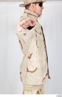  Photos Army Man in Camouflage uniform 12 21th century Army desert uniform jacket upper body 0007.jpg